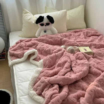 Pink plush throw blanket with white fleece trim featuring a cozy lamb wool flower pattern for decorbites cozy lamb bedding