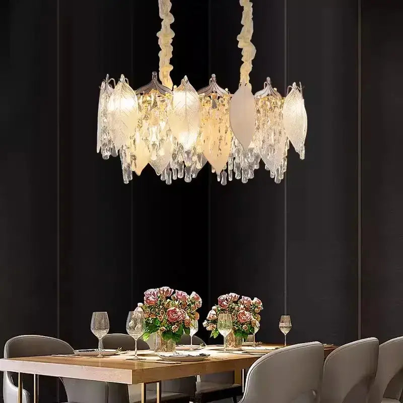 Elegant leaf shaped gold pendant light with frosted glass and crystal droplets from decorbites crystal glass chandelier collection