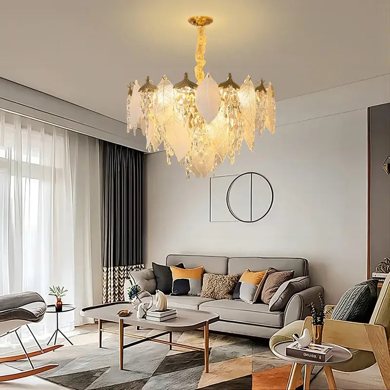 Gold-toned pendant light featuring layered leaf shaped crystal glass and frosted elements for dining room decorbites crystal glass chandelier