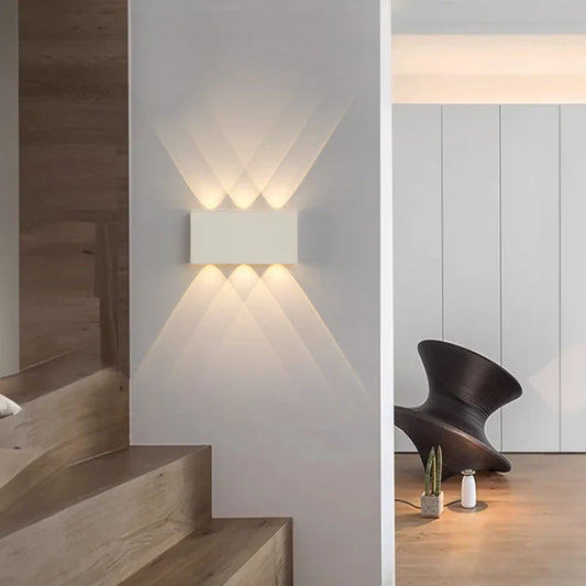 Rectangular wall light with six beams.