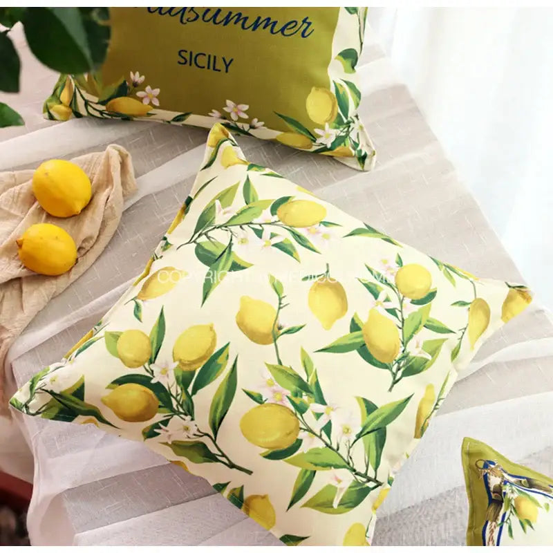 Cream-colored lemon print chenille cushion cover with yellow lemons green leaves and white blossoms for living room decorbites decor