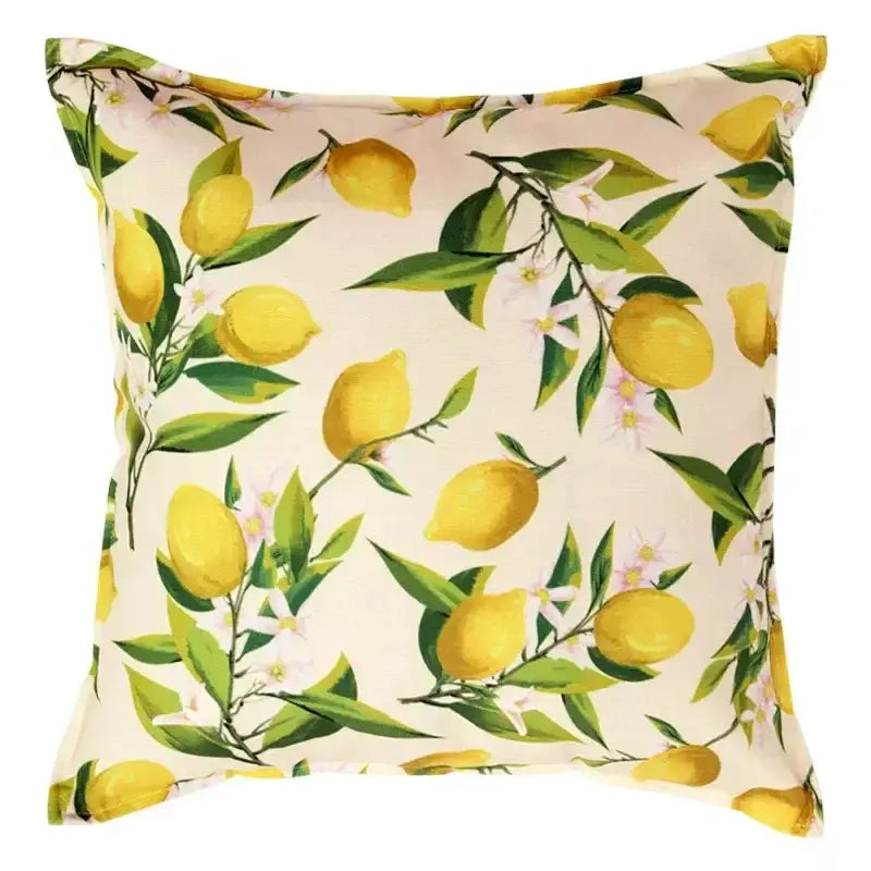 A square lemon print chenille cushion cover with yellow lemons green leaves and white flowers on a cream decorbites design