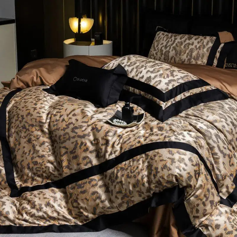 Leopard jacquard black and gold lyocell cotton bedding set featuring satin leopard print with black trim and gold accents