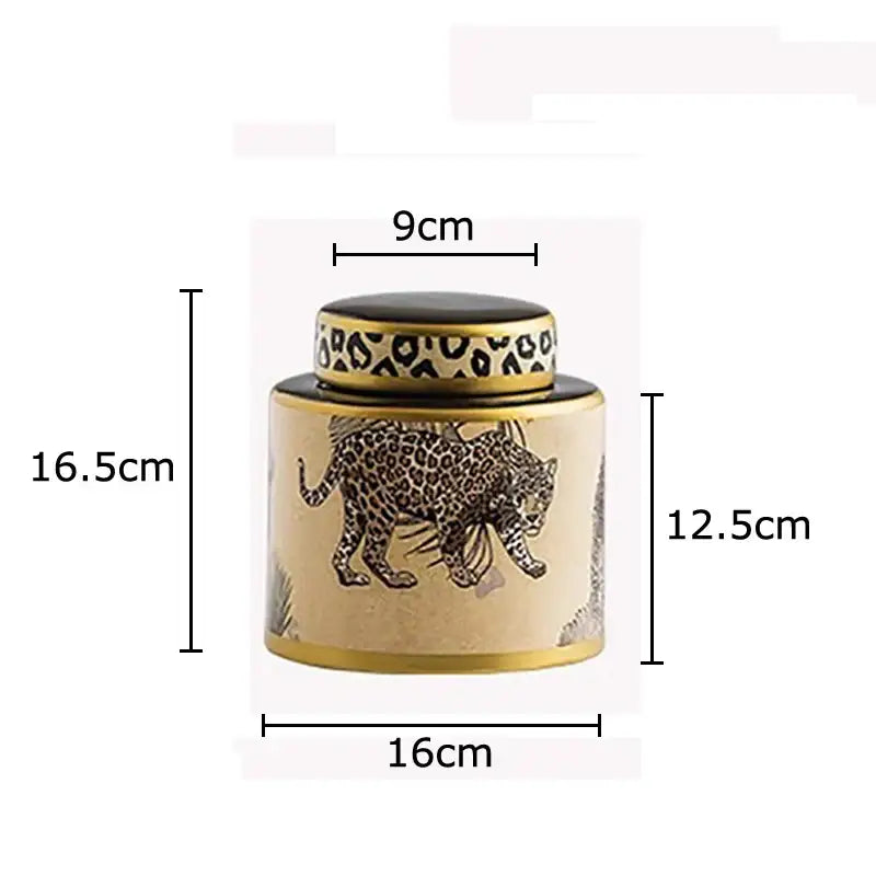 Cream ceramic storage jar with leopard pattern and gold rim featuring decorbites leopard pattern for jewelry or decor