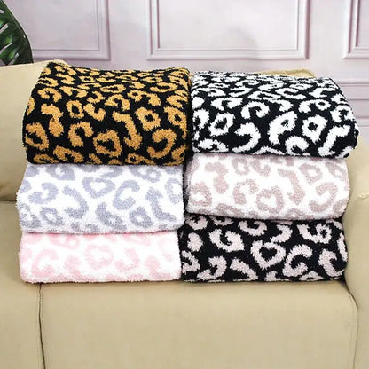 Soft plush leopard print cozy flannel velvet blankets in black gold white gray and pink cream for bedroom sofa decorbites cozy flannel