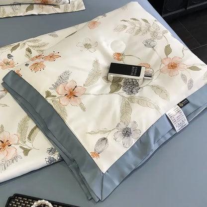 A cream satin leopard print summer pillow sham with floral pattern and solid slate blue border for decorbites leopard print decor