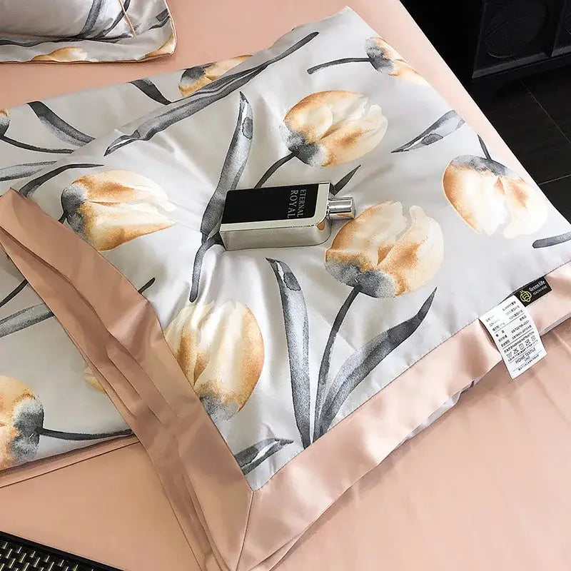 A soft light pink satin pillowcase with peach and gray tulip floral pattern complementing decorbites leopard print decorbites leopard print summer bedroom decor