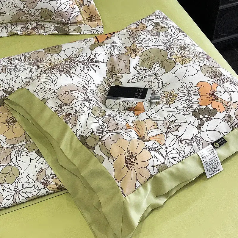 A cream and blue leopard print satin pillow sham with a soft white satin pillowcase featuring a floral pattern decorbites leopard print summer