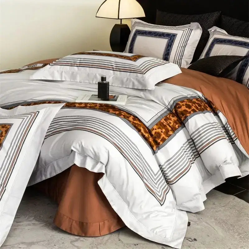 Elegant white bedding set with bold leopard print accents and geometric black-gray trim on rust bed skirt decorbites 1000tc egyptian cotton