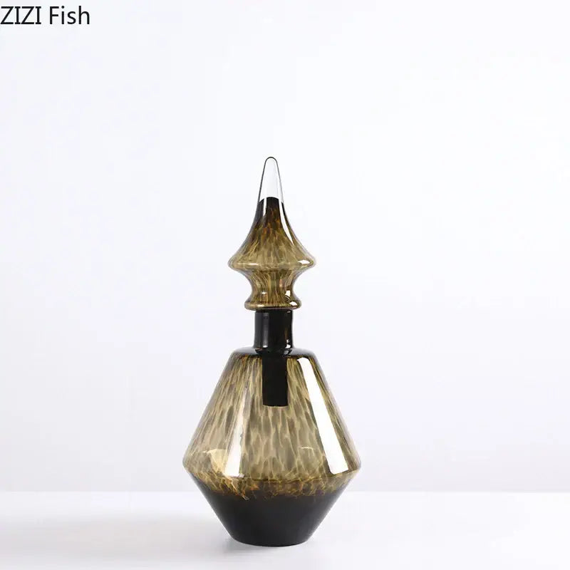 A sleek amber and black leopard print glass decanter with stopper and black base for decorbites leopard print decor