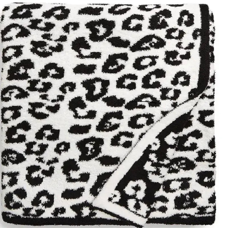 White and black leopard print fleece blanket with plush fuzzy texture for bedroom sofa decorbites leopard print throw