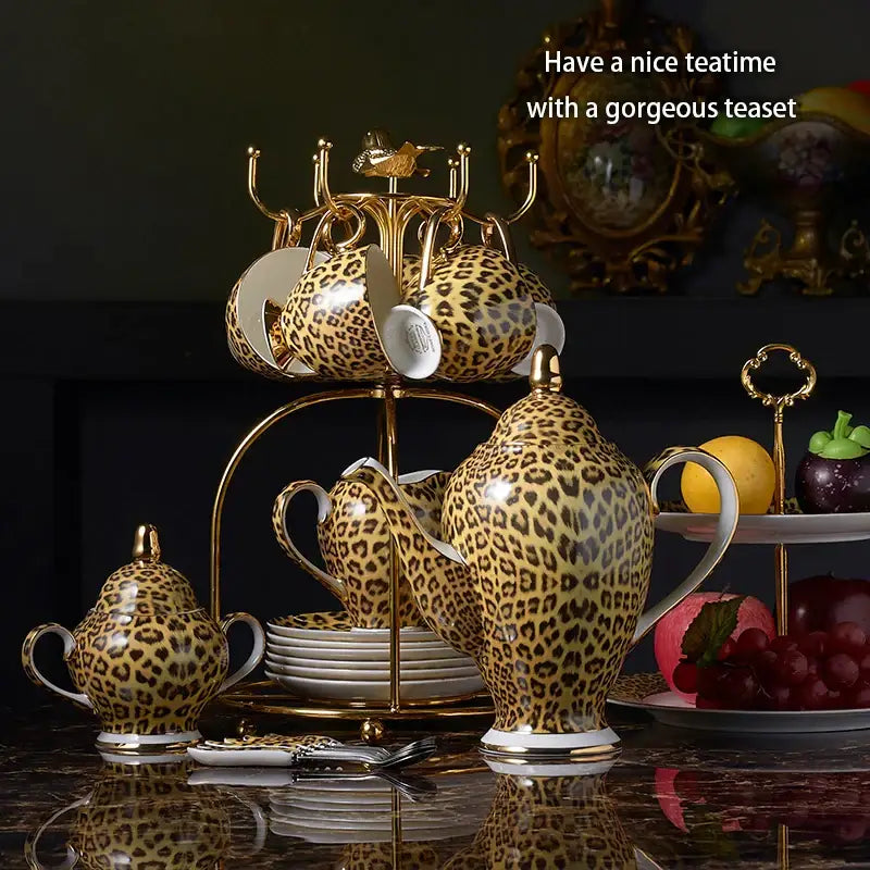 Leopard print ceramic coffee set with gold accents and matching tiered stand decorbites leopard print dining room decor
