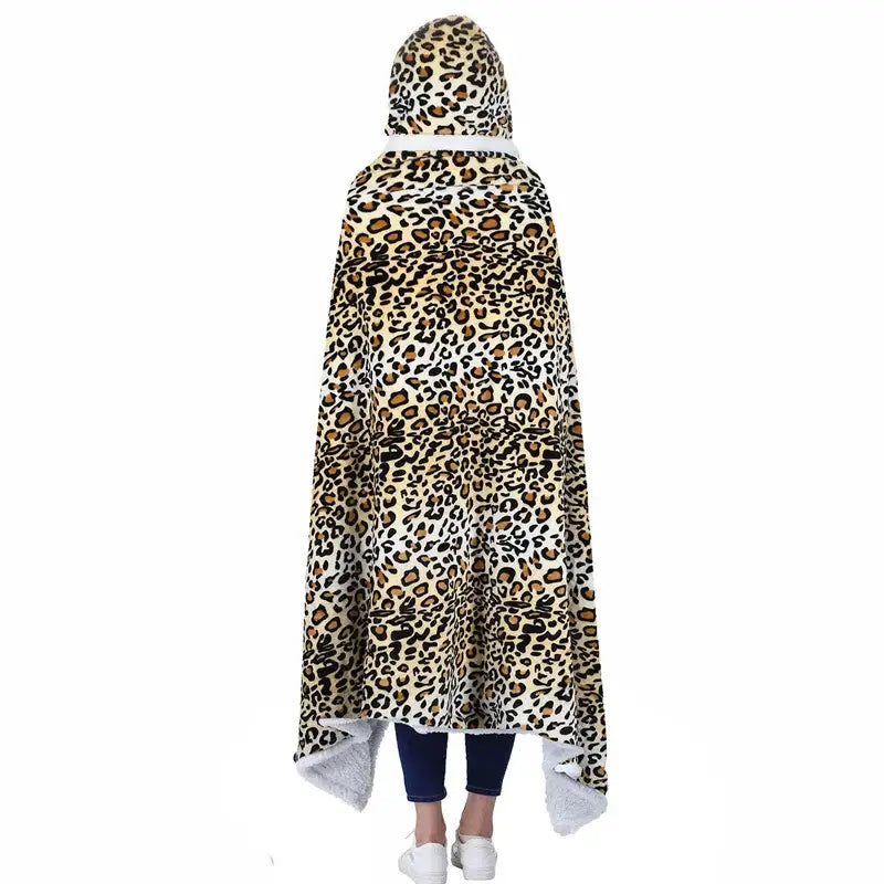 A decorbites leopard print warm wearable hooded blanket with soft plush exterior and white faux fur lining