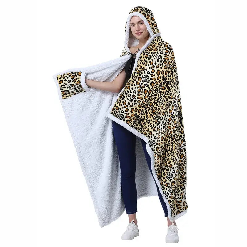 Leopard print warm wearable hooded blanket with plush white fleece lining and soft cozy texture by decorbites