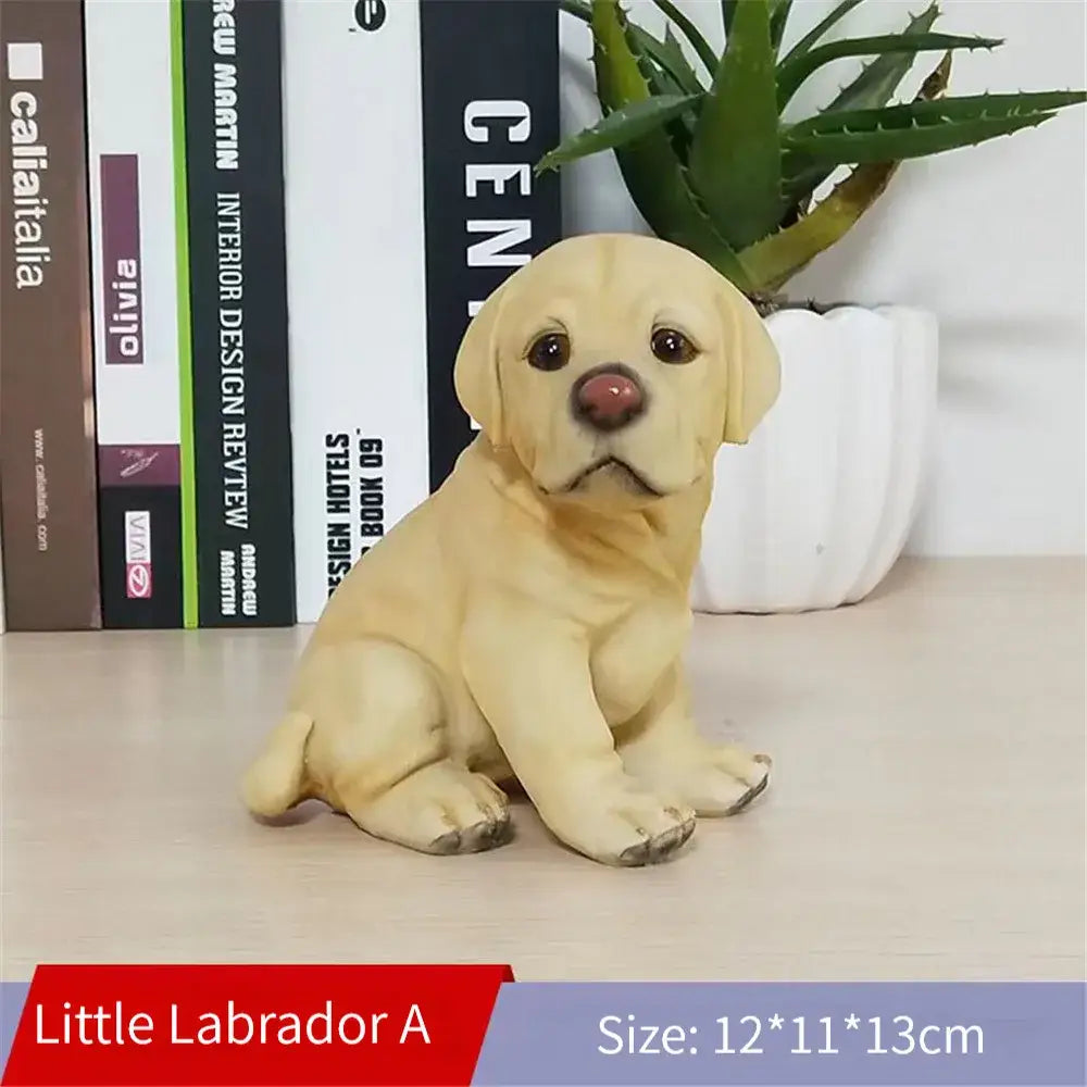 A lifelike black and white resin dog sculpture featuring a yellow labrador puppy with expressive eyes for decorbites dog decor