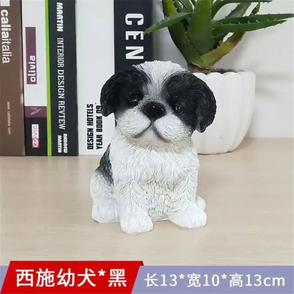 Black and white resin shih tzu puppy dog sculpture sitting on wooden surface for decorbites dog sculpture decor
