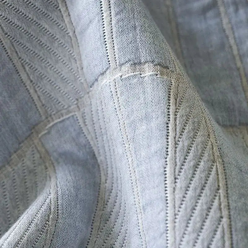 Light blue and gray decorbites cotton summer cool quilt towel blanket with light gray textured fabric and subtle diagonal ribbing