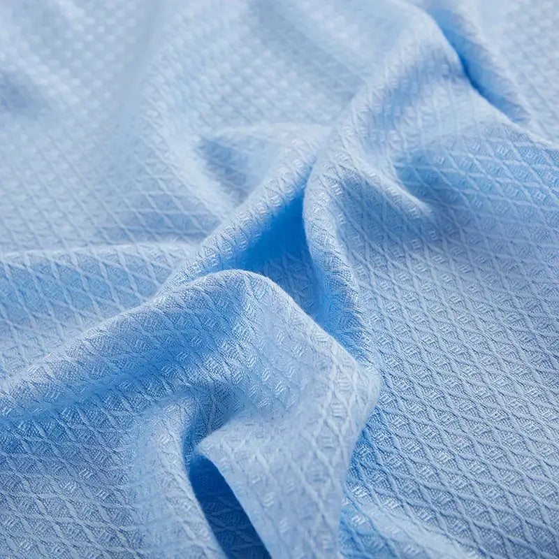Light blue bamboo fiber summer quilt with subtle diamond grid texture for decorbites bamboo fiber bedding