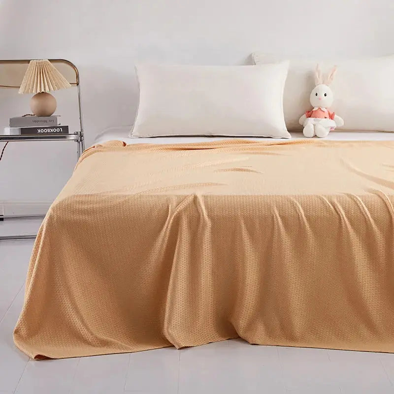 Soft warm-toned beige textured bedspread with subtle woven pattern made of bamboo fiber summer quilt for decorbites