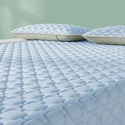 Light blue quilted bedroom mattress pad with shell pattern featuring decorbites cooling latex pad for comfort