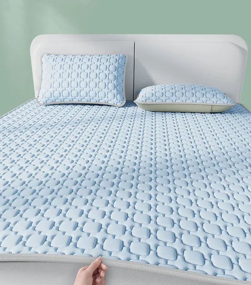 Light blue quilted mattress pad with geometric pattern made from cooling latex pad by decorbites cooling latex