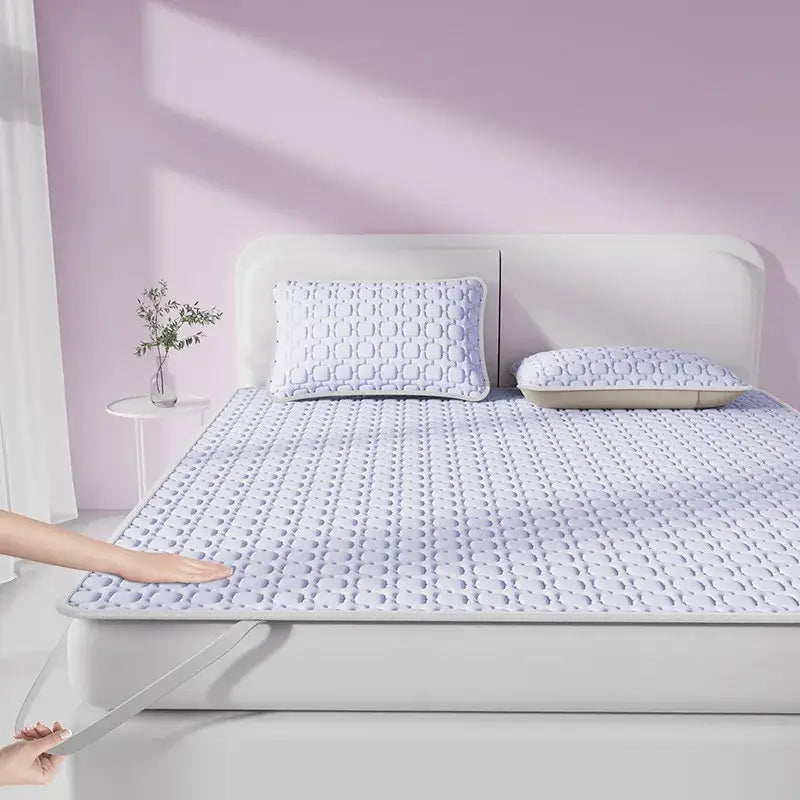 Light purple quilted mattress pad with raised dot pattern designed as a cooling latex pad by decorbites cooling latex