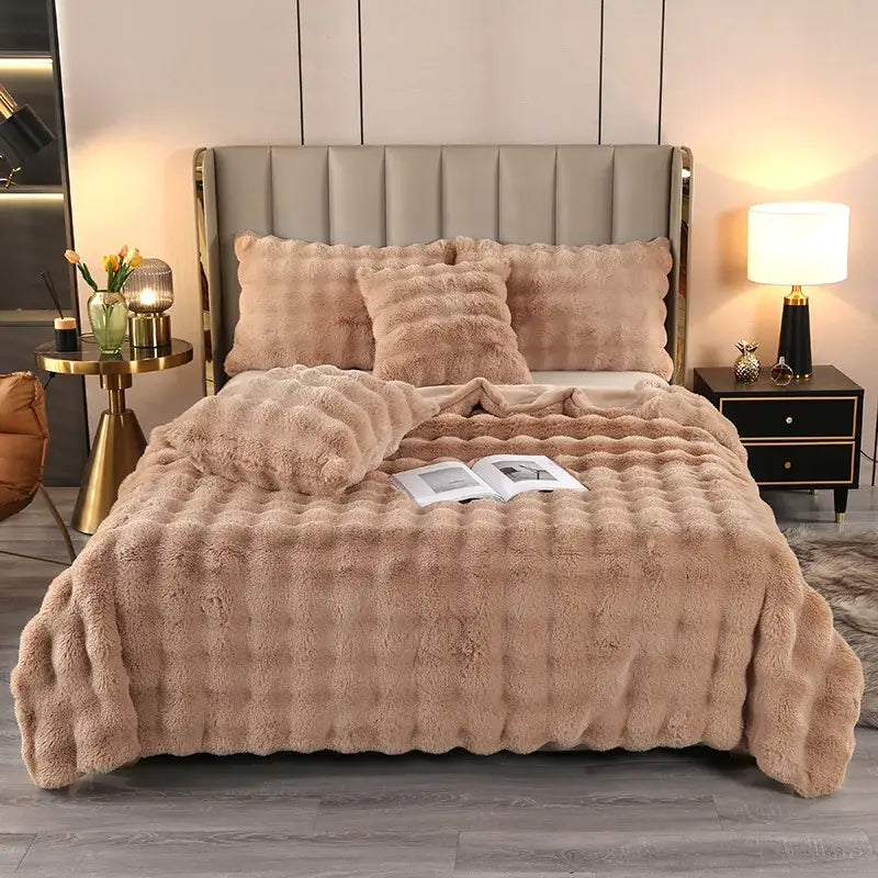 Beige faux fur quilted throw blanket with a soft fluffy texture featured in decorbites bubble rabbit velvet collection