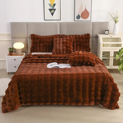 Warm rust-colored faux fur bed set with plush quilt and pillows featuring decorbites bubble rabbit velvet texture
