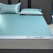 Light blue cooling jacquard fitted sheet mattress protector with textured surface silver border and antibacterial feature