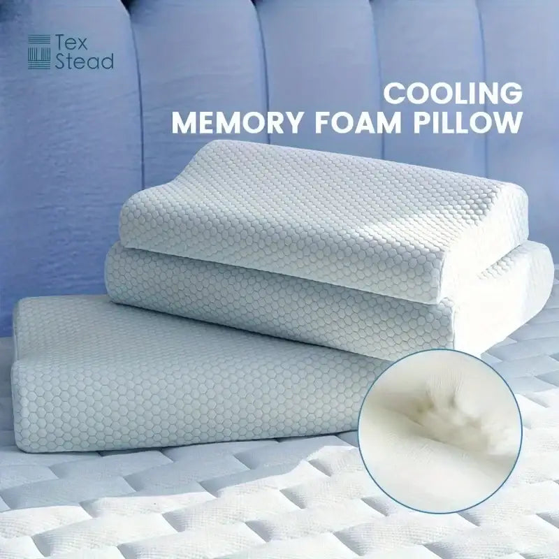 Light blue cooling memory foam contour neck pillow with white cooling memory foam and textured hexagonal pattern