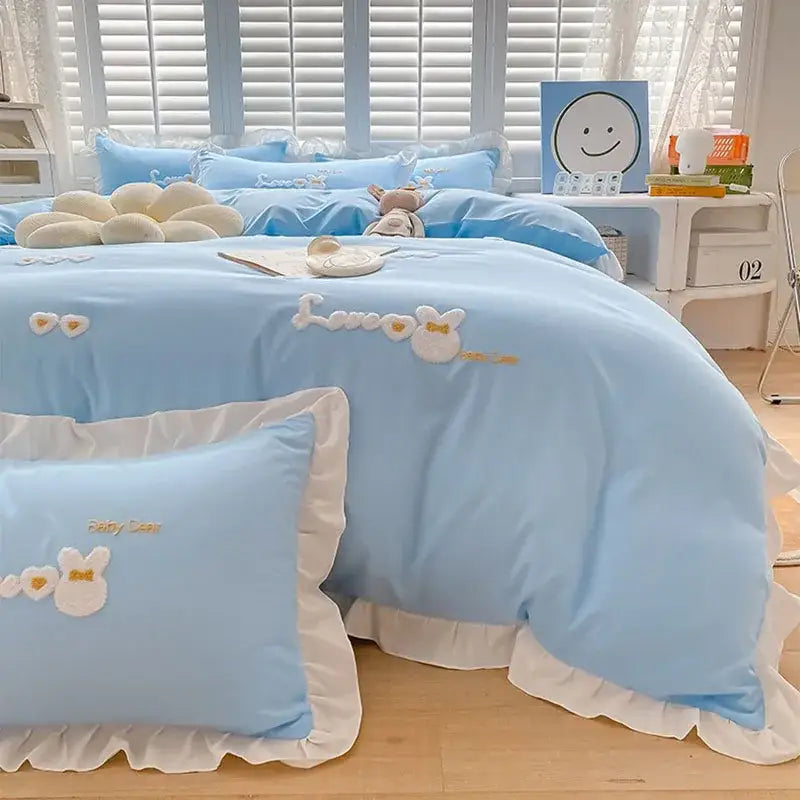 Light blue cotton bedding set with decorbites cartoon embroidery and white ruffled edges for bedroom decor