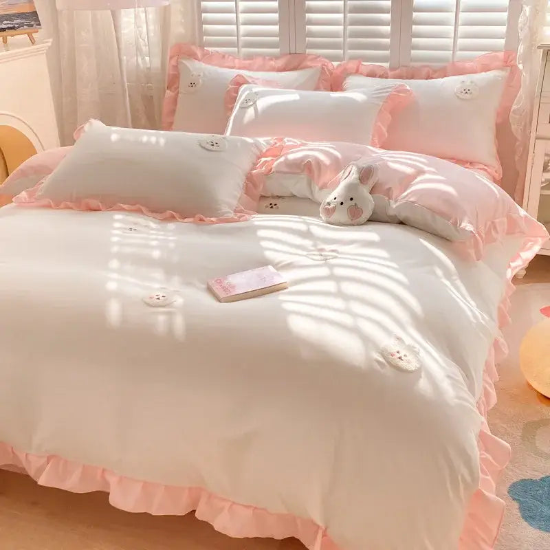 Light blue cotton bedding set with pink ruffled decorbites cartoon embroidery and white pillows for bedroom decor