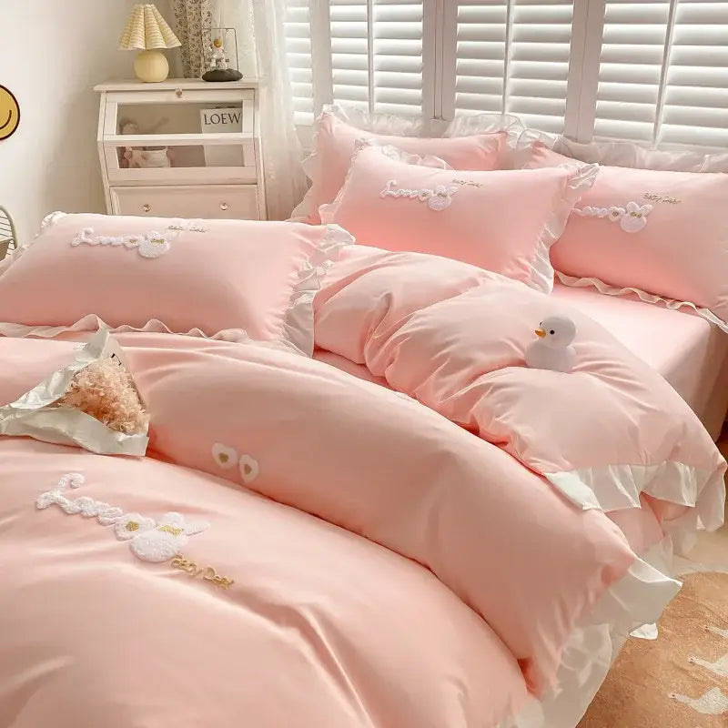 Pink satin bedding set with white ruffled edges and embroidered floral designs for bedroom decorbites cartoon embroidery