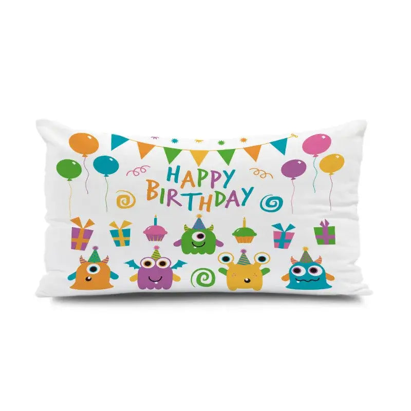 White rectangular pillowcase with colorful happy birthday design featuring cartoon monsters and decorbites dinosaur animal theme