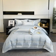 Light blue egyptian cotton embroidery bedding set with satin-like duvet cover featuring gold thread accents and circular motif