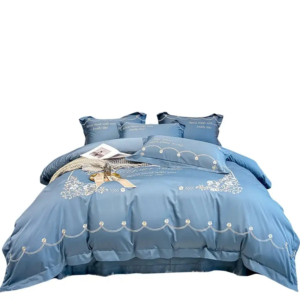 Light blue embroidered egyptian cotton bedding sets with satin luxe finish featuring delicate white floral embroidery and lace trim