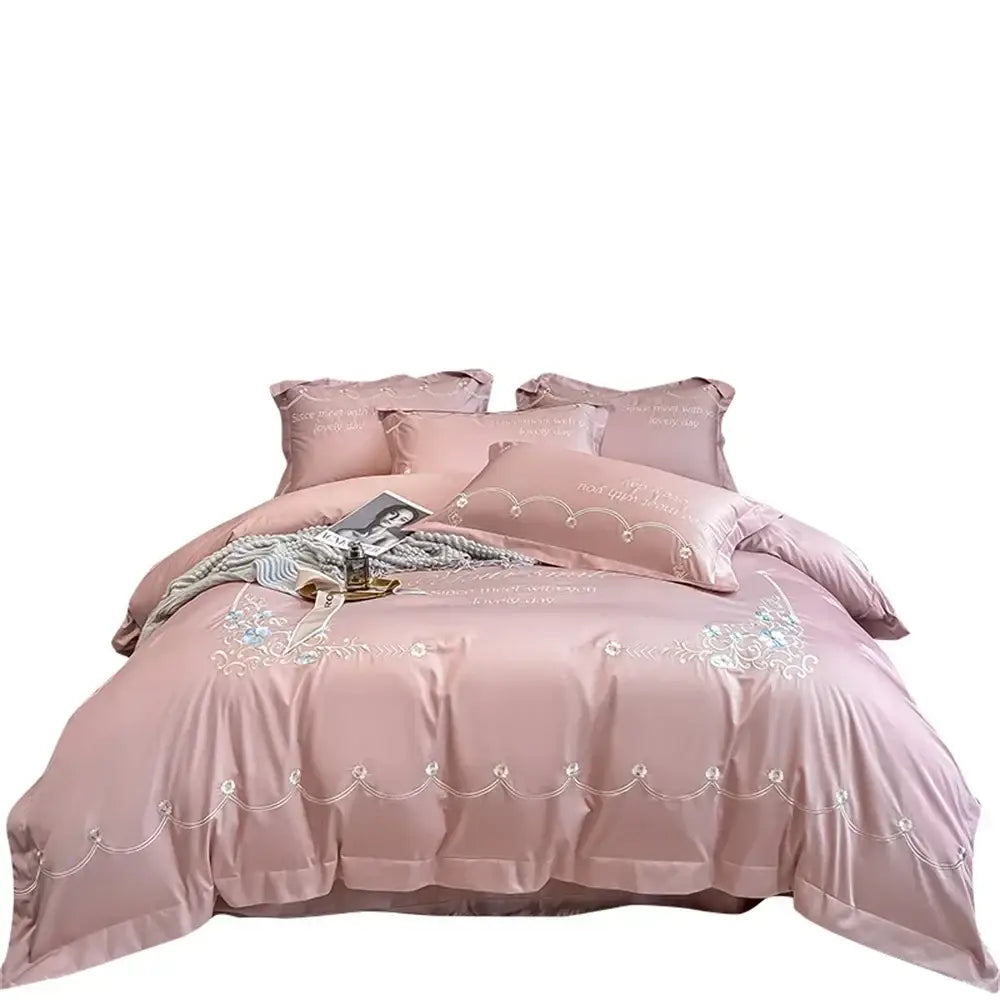 Pink satin bedding set with white floral embroidery and scalloped lace trim in egyptian cotton bedding sets