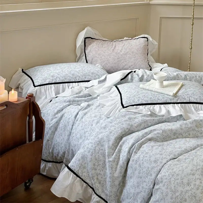 Light blue floral cotton bedding sets with delicate white ruffles and contrasting black trim for bedroom decorbites cotton bedding