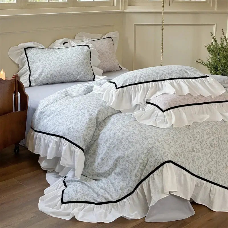 White ruffled cotton bedding sets with delicate gray floral patterns and black trim from decorbites cotton bedding collection
