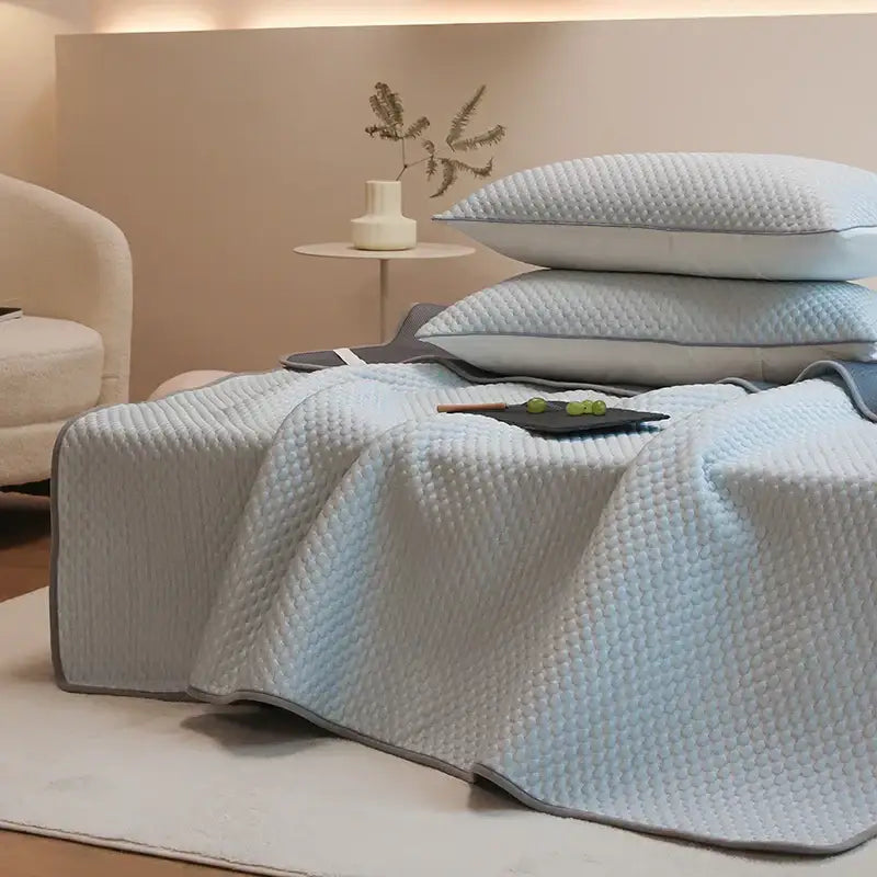 Light blue quilted bedspread with gray border from decorbites ice bean bed sheet set for cooling sleep comfort