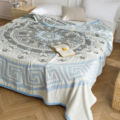 Light blue and gray patterned cotton gauze summer blanket with mandala design and geometric borders by decorbites cotton gauze