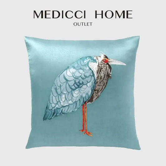 Light blue heron embroidered silk throw pillow cover featuring detailed feathers red eye and orange legs for living room