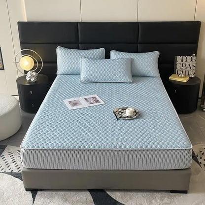 Light blue hexagonal ice silk cooling bed mat set with quilted honeycomb texture and gray perforated side panels