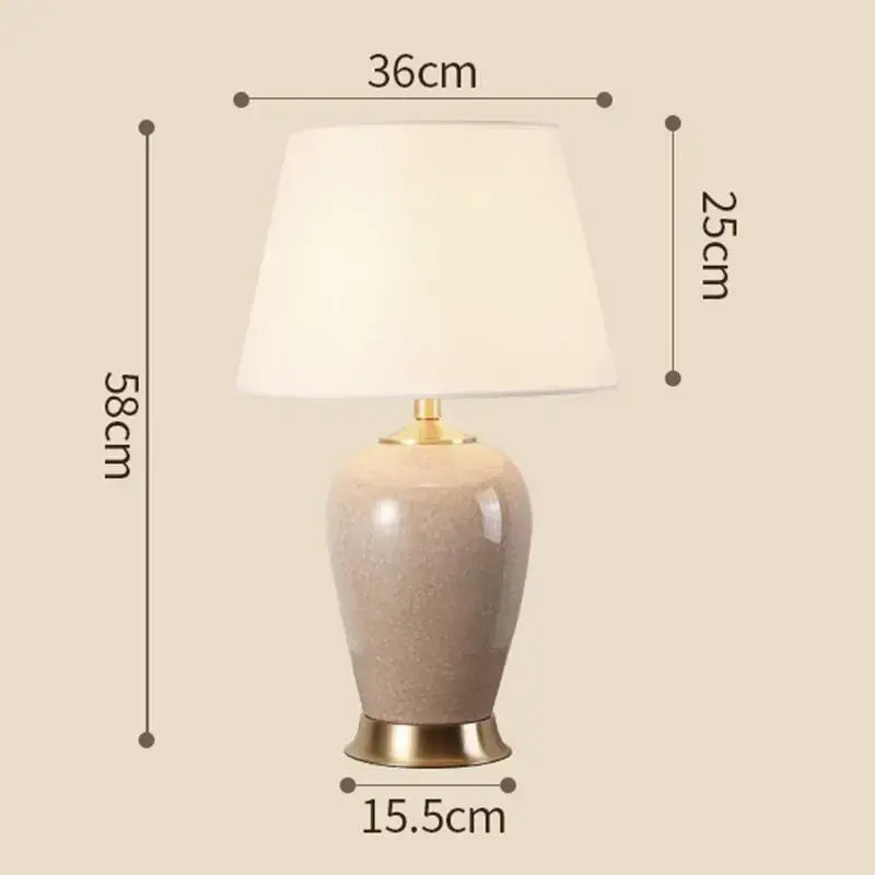 Beige ceramic table lamp with gold base and cream fabric shade by decorbites ice crack for bedroom decor