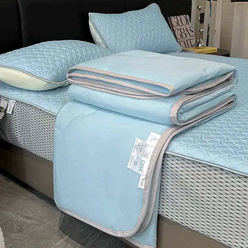 Light blue ice silk quilt set with gray piping and subtle hexagonal pattern for decorbites cool feeling bedding