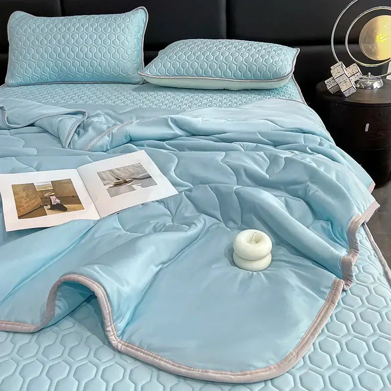 Light blue quilt set with hexagonal stitching and satin-like finish for decorbites cool feeling ice silk bedding