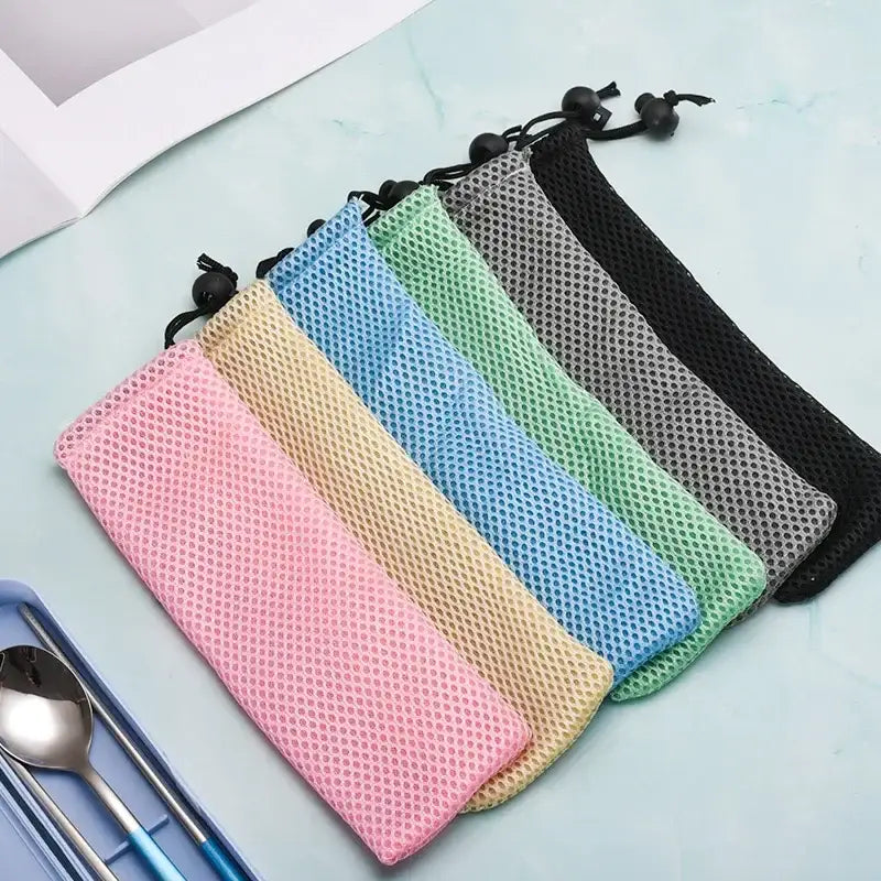 A set of colorful decorbites cotton linen mesh drawstring cutlery cases including light blue for dining travel