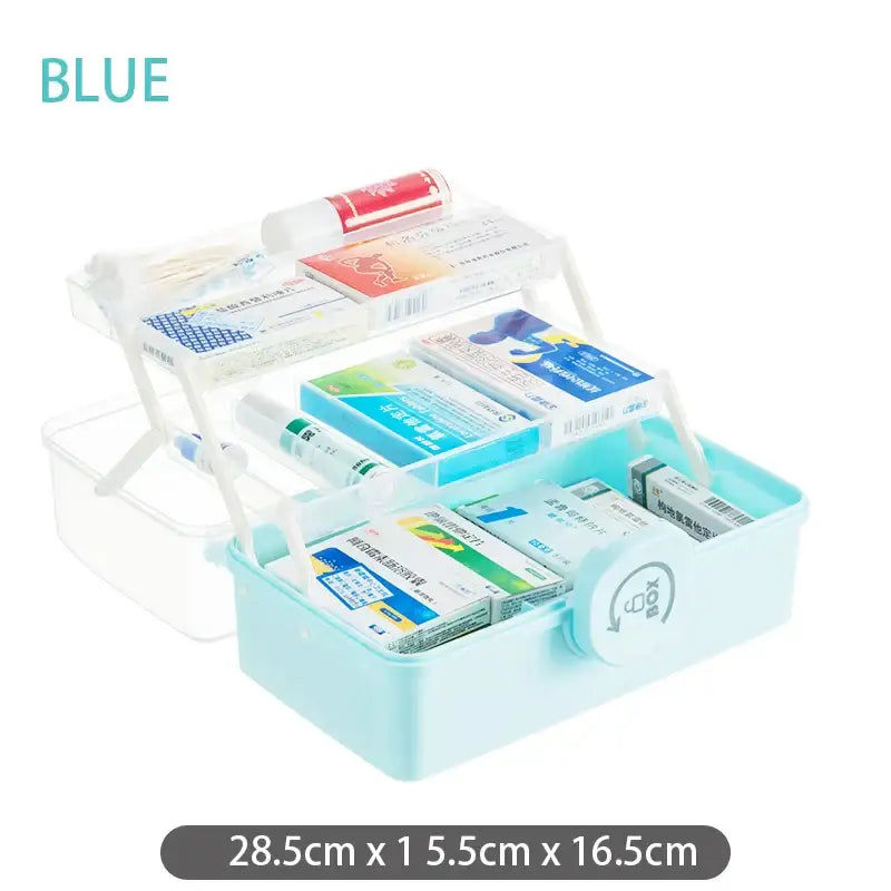 Light blue multifunctional emergency box aid kit with two-tiered clear plastic compartments and white handles by decorbites household