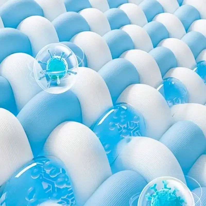 Light blue panda cooling antibacterial mattress with blue and white textured surface showing virus-like spheres decorbites cooling antibacterial