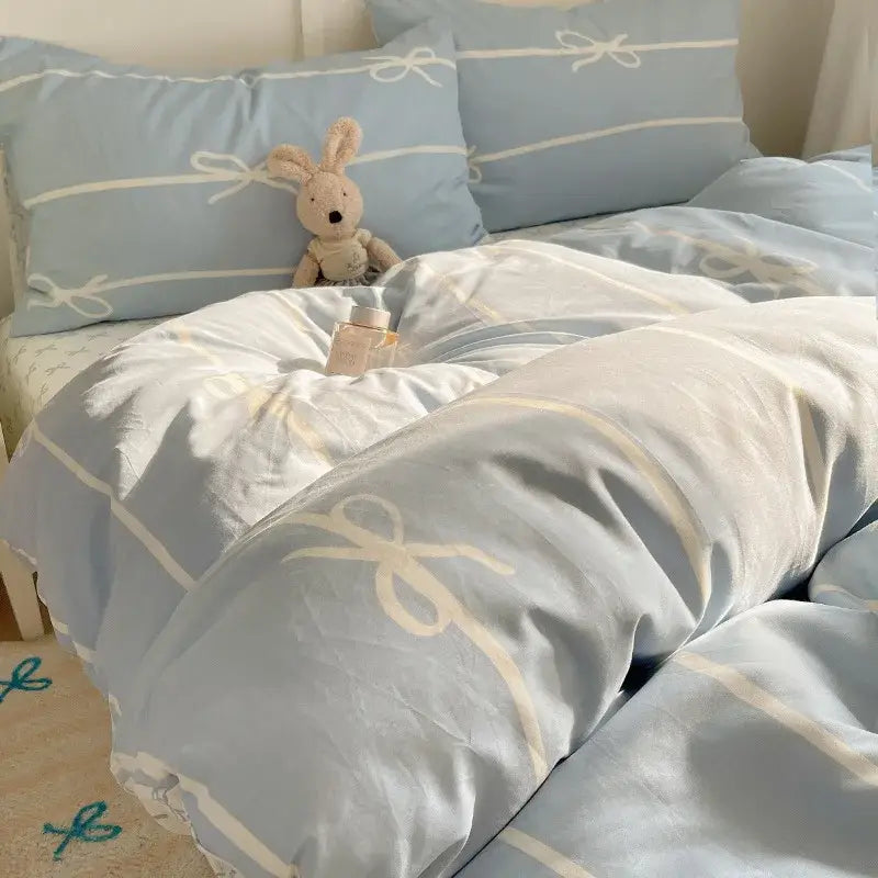 Light blue cotton bedding set with cream ribbon bow decorbites cartoon pattern for bedroom use